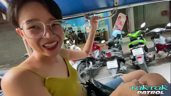 Horny Thai with short hair and glasses trying out thick white penis