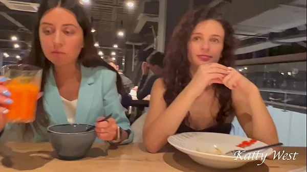 Two shameless chicks have lunch without panties at the mall in public