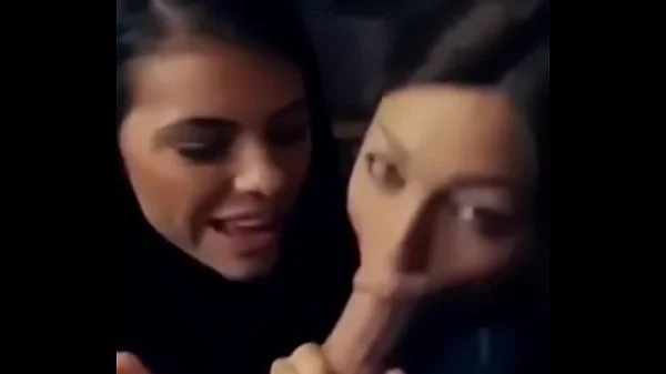 Two hotties doing a nice blowjob