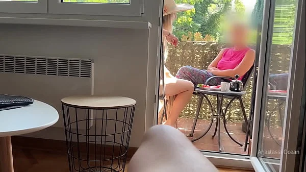 My husband is jerking off and cum in front of my stepmom a while we talk on balcony.