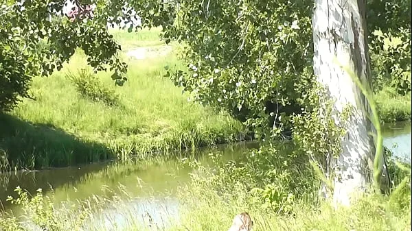 Milf sexy woman sunbathing naked on river bank. Random guy is watching. Naked in public. Public. Publicly. Wild beach Nudist. Perfect ass. Pussy. Blonde. Doggystyle. Woman got into doggy style position. Outdoor. Outside. Outdoors. Nudists. Naturist. POV