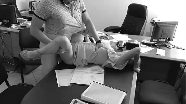 The boss fucks his tiny secretary on the office table and films it on hidden camera