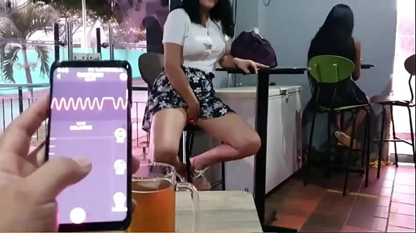 Martinasmith squirt over the waiter's shoes at the bar