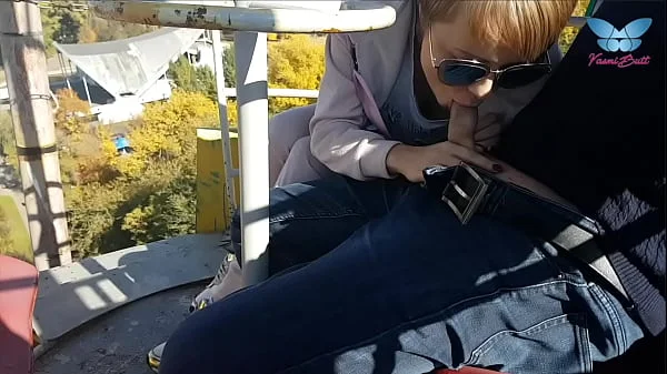 Public blowjob on the ferris wheel from shameless whore